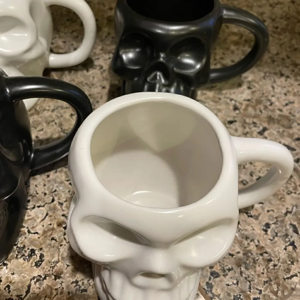 Hyde and EEK Stoneware Skull Mugs  Set of 4 with 3 Shot Glasses